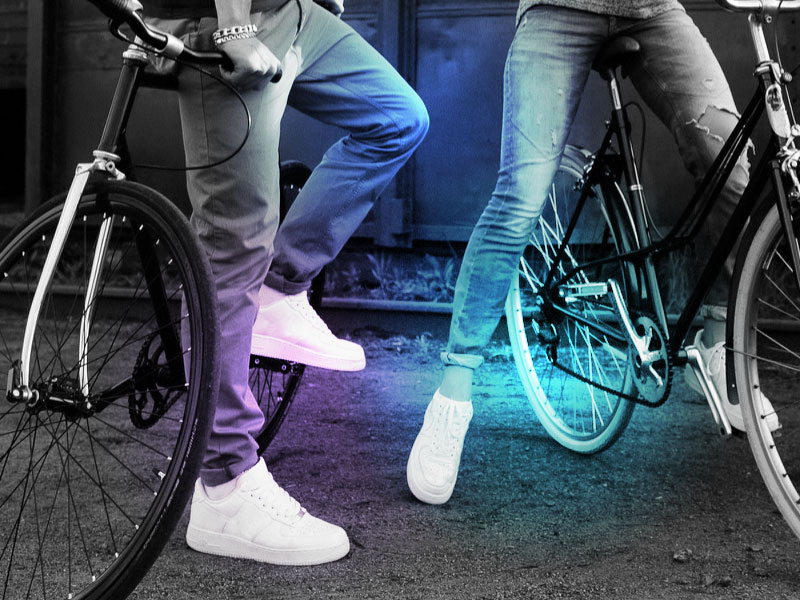Two cyclists on bicycles